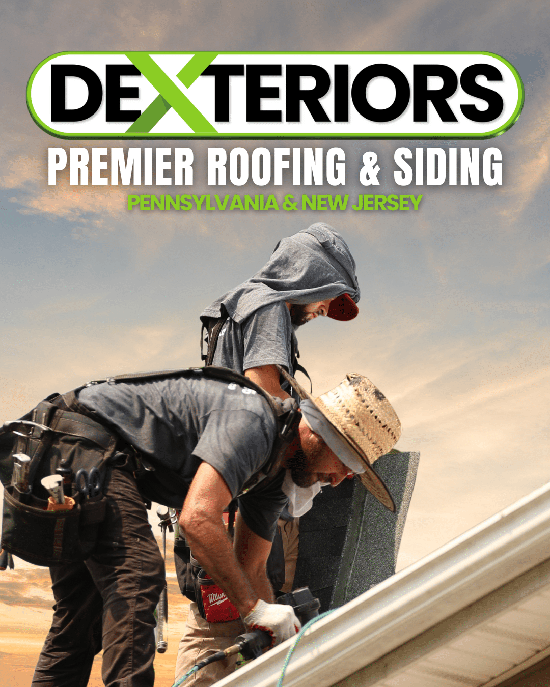 Two men working together to install shingles on a residential roof under a clear sky