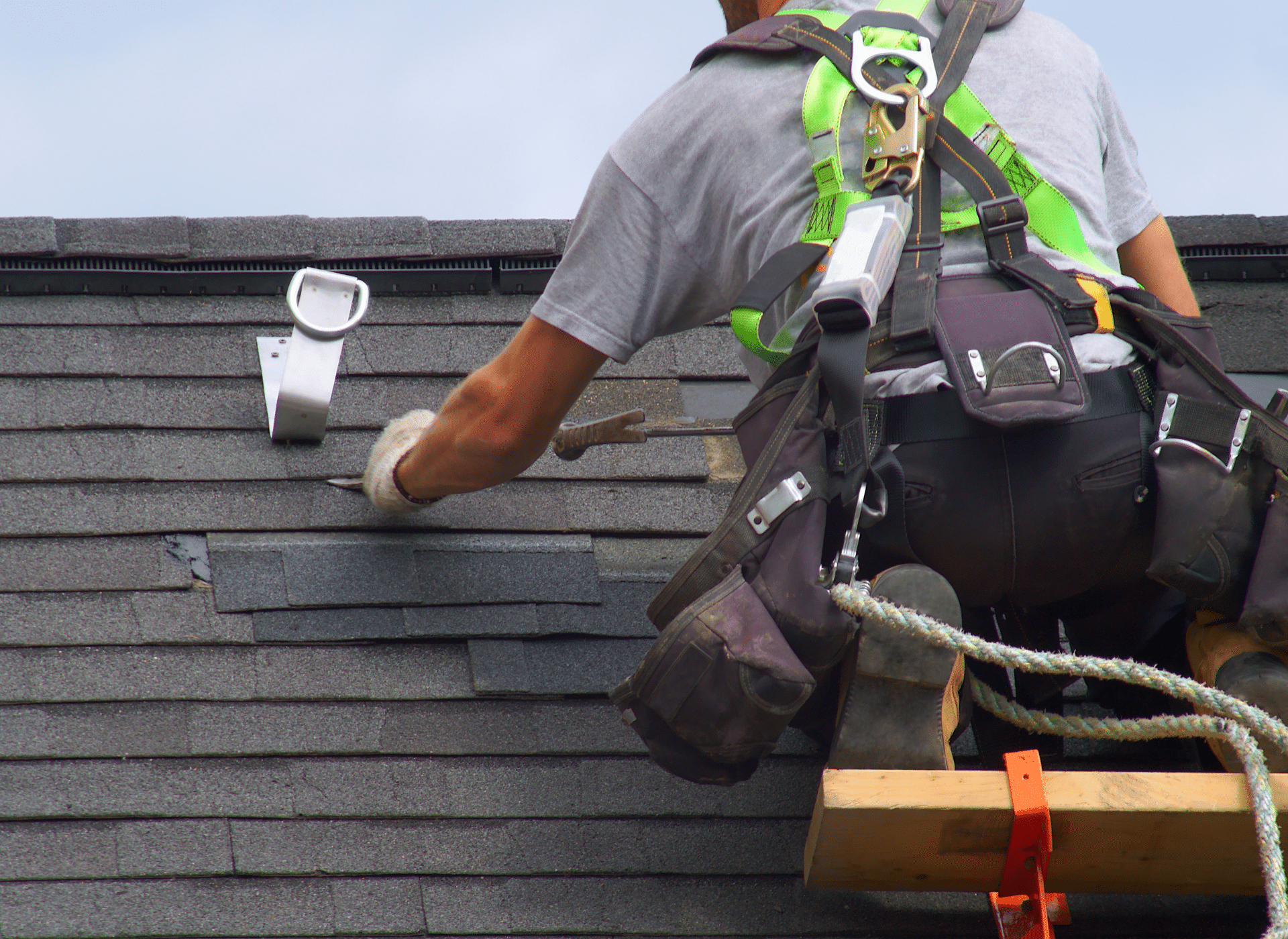 Storm-damaged asphalt shingle roof repair